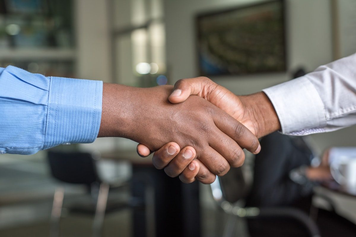 Professional handshake between service provider and client